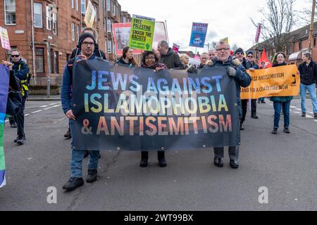 Glasgow, Écosse, Royaume-Uni. 16 mars 2024. marche et rassemblement du siège de la BBC en Écosse au centre de l'immigration du Home Office, marquant la Journée des Nations Unies pour l'élimination de la discrimination raciale, pour souligner les obligations internationales du Royaume-Uni dans la lutte contre le racisme et la xénophobie crédit : R.Gass/Alamy Live News Banque D'Images