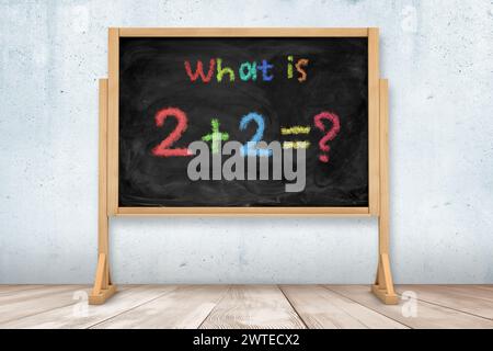 Simple problème de maths écrit sur le tableau noir de la classe Banque D'Images