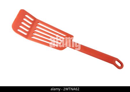 une spatule de cuisine perforée sur un fond transparent Banque D'Images