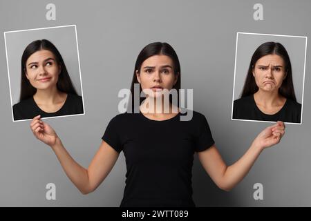 Femme tenant ses portraits photo montrant différentes émotions sur fond gris. Personnalité équilibrée Banque D'Images