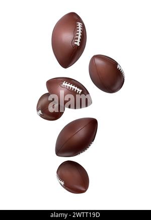 Balles de football américain tombant sur fond blanc Banque D'Images