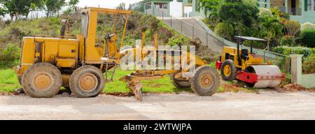 Compacteur routier et niveleuse Banque D'Images