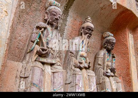 Statues de Bouddhas à la sculpture rocheuse de Dazu, montagne Baodingshan, Chongqing, Chine Banque D'Images
