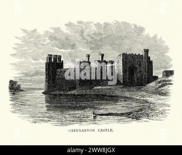 Château de Caernarfon (Carnarvon), une forteresse médiévale à Caernarfon, Gwynedd, au nord-ouest du pays de Galles. Banque D'Images