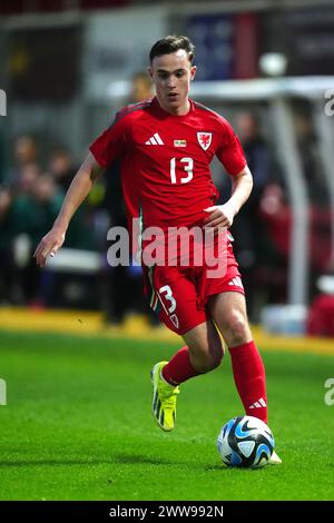 Le gallois Luke Harris en action lors du match de l'UEFA Euro U21 Championship Group I à Rodney Parade, Newport. Date de la photo : vendredi 22 mars 2024. Banque D'Images