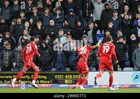 Birkenhead, Royaume-Uni. 23 mars 2024. Jay Williams de Crawley Town célèbre devant les fans des Tranmrer Rovers après avoir marqué le 2e but de son équipe. EFL Skybet Football League Two match, Tranmere Rovers v Crawley Town à Prenton Park, Birkenhead, Wirral le samedi 23 mars 2024. Cette image ne peut être utilisée qu'à des fins éditoriales. Usage éditorial exclusif, .pic par Chris Stading/ crédit : Andrew Orchard sports Photography/Alamy Live News Banque D'Images