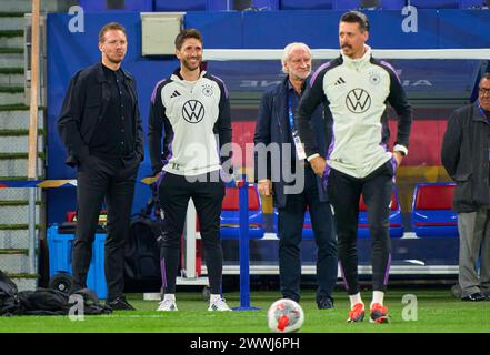 Julian Nagelsmann , Bundestrainer, Nationaltrainer, Rudi Völler, Voeller (DFB Sportdirektor), Sandro Wagner, Benjamin Glück, assistent entraîneur DFB dans le match amical FRANCE - ALLEMAGNE 0-2 FRANKREICH - DEUTSCHLAND 0-2 en préparation pour les Championnats d'Europe 2024 le 23 mars 2024 à Lyon, France. © Peter Schatz / Alamy Live News Banque D'Images