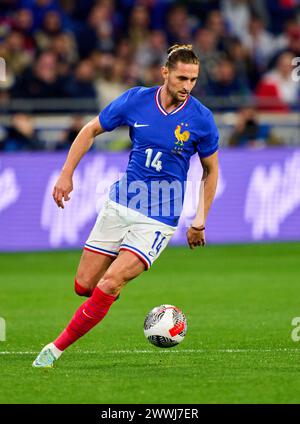 Adrien Rabiot, FRA 14 dans le match amical FRANCE - ALLEMAGNE 0-2 FRANKREICH - DEUTSCHLAND 0-2 en préparation pour les Championnats d'Europe 2024 le 23 mars 2024 à Lyon, France. © Peter Schatz / Alamy Live News Banque D'Images