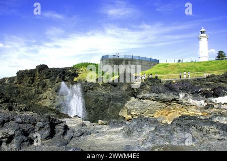 Kiama Blowhole and Lighthouse, Blowhole point, Kiama, Nouvelle-Galles du Sud, Australie Banque D'Images