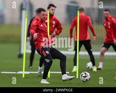 Cardiff, Royaume-Uni. 25 mars 2024. Aaron Ramsey du pays de Galles lors de l'entraînement de l'équipe de football du pays de Galles à Hensol, Vale of Glamorgan au pays de Galles du Sud le lundi 25 mars 2024. L'équipe s'entraîne avant le match de qualification de l'UEFA Euro 2024 contre la Pologne demain. photo par Andrew Orchard/Andrew Orchard photographie sportive/ Alamy Live News crédit : Andrew Orchard photographie sportive/Alamy Live News Banque D'Images