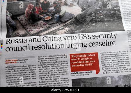 "La Russie et la Chine veto à la résolution du conseil de sécurité des États-Unis appelant au cessez-le-feu" le journal Guardian titre Israël guerre du Hamas à Gaza article 23 mars 2024 Banque D'Images