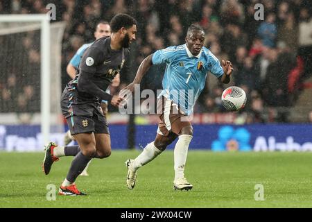 Londres, Royaume-Uni. 26 mars 2024. Le belge Jeremy Doku photographié en action lors d'un match amical de football entre l'Angleterre et l'équipe nationale belge des Red Devils, le mardi 26 mars 2024 à Londres, au Royaume-Uni. Les équipes se préparent pour ce tournoi Summers Euro 2024. BELGA PHOTO BRUNO FAHY crédit : Belga News Agency/Alamy Live News Banque D'Images