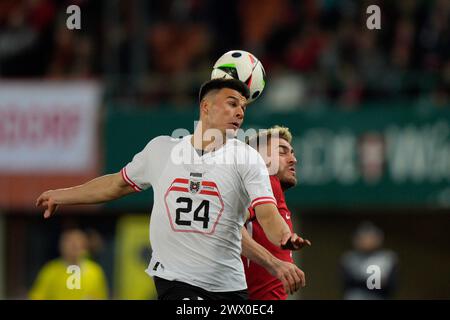 Vienne, Vienne. 26 mars 2024. VIENNE, VIENNE - MARS 26 : Flavius Daniliuc d'Autriche et Baris Alper Yilmaz de Turkiye lors du match amical international entre l'Autriche et Turkiye au stade Ernst Happel le 26 mars 2024 à Vienne, Autriche.240326 SEPA 19 070 - 20240326 PD12816 crédit : APA-defacto Datenbank und Contentmanagement GmbH/Alamy Live News Banque D'Images