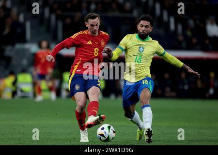 Madrid, Espagne. 26 mars 2024. Madrid Espagne ; 03/26/2024.- L'Espagne tire le Brésil 3-3 dans un match amical. L'équipe nationale espagnole sera le match nul 3-3 avec son homologue brésilien au stade Santiago Bernabeu dans la capitale du Royaume d'Espagne. Objectif espagne Rodri Hernandez 12 (pénalité) et 87 (pénalité), Dani Olmo 36  objectif Brésil Rodrigo Goes 40 , Endrikc Felipe 50 , Lukas lPaqueta 90 6 , crédit : Juan Carlos Rojas/dpa/Alamy Live News Banque D'Images