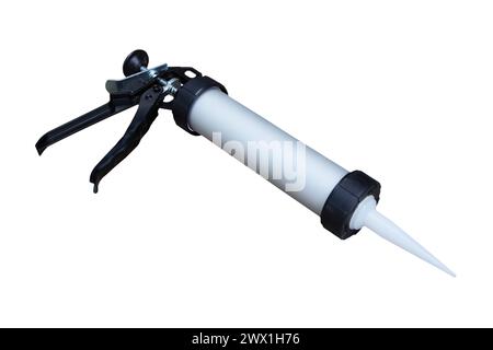 seringue de construction pour le remplissage des joints sur fond blanc Banque D'Images