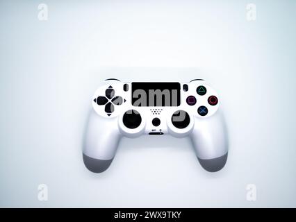 Plongez dans le monde des jeux vidéo avec une manette de jeu blanche élégante, l'accessoire ultime pour une expérience de divertissement numérique passionnante. Banque D'Images