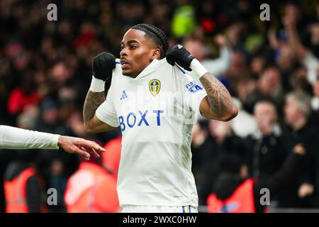 Watford, Royaume-Uni. 27 mars 2024. Le Crysencio Summerville de Leeds United célèbre avoir marqué le premier but de son équipe lors du match du Watford FC vs Leeds United FC SKY Bet EFL Championship à Vicarage Road, Watford, Angleterre, Royaume-Uni le 29 mars 2024 Credit : Every second Media/Alamy Live News Banque D'Images