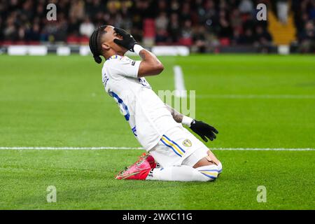 Watford, Royaume-Uni. 27 mars 2024. Le Crysencio Summerville de Leeds United célèbre avoir marqué le premier but de son équipe lors du match du Watford FC vs Leeds United FC SKY Bet EFL Championship à Vicarage Road, Watford, Angleterre, Royaume-Uni le 29 mars 2024 Credit : Every second Media/Alamy Live News Banque D'Images