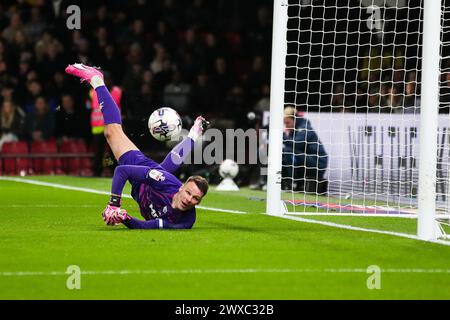 Watford, Royaume-Uni. 27 mars 2024. Le gardien de but de Watford Daniel Bachmann sauve un tir lors du match du Watford FC v Leeds United Sky Bet EFL Championship à Vicarage Road, Watford, Angleterre, Royaume-Uni le 29 mars 2024 crédit : Every second Media/Alamy Live News Banque D'Images