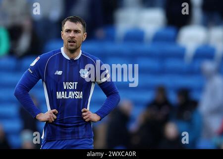 Cardiff, Royaume-Uni. 29 mars 2024. Aaron Ramsey de Cardiff City regarde. EFL Skybet championnat match, Cardiff City v Sunderland au Cardiff City Stadium de Cardiff, pays de Galles, le vendredi Saint 29 mars 2024. Cette image ne peut être utilisée qu'à des fins éditoriales. Usage éditorial exclusif, photo par Andrew Orchard/Andrew Orchard photographie sportive/Alamy Live News crédit : Andrew Orchard photographie sportive/Alamy Live News Banque D'Images