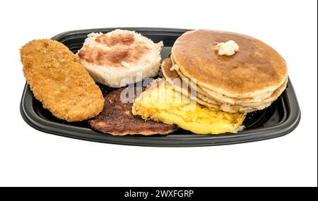 Winneconne, WI - 30 mars 2024 : un paquet de McDonalds Big Breakfast avec petits gâteaux, biscuits, pommes de terre sautées, saucisses, œufs brouillés petit déjeuner sur un isolat Banque D'Images