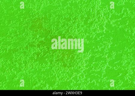 Fond de texture de motif abstrait de surface de mur de peinture vert acide brillant. Banque D'Images