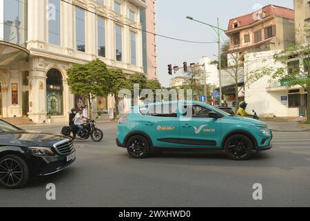 Les taxis électriques Vinfast apparaissent dans les grandes villes du Vietnam. 베트남 전기차, ベトナムの電気自動車, वियतनामी इलेक्ट्रिक कारें, 越南电动汽车 Xanh SM Taxi Banque D'Images