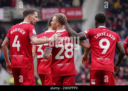 Middlesbrough, Royaume-Uni. 01st Apr, 2024. L'attaquant de Middlesbrough Emmanuel Latte Lath (9), le milieu de terrain de Middlesbrough Lewis O'Brien (28), le milieu de terrain de Middlesbrough Dan Barlaser (4) célèbre le défenseur de Sheffield mercredi Michael Ihiekwe (20) marquant son propre but 1-0 lors du match Middlesbrough FC vs Sheffield mercredi FC Sky Bet EFL Championship au Riverside Stadium, Middlesbrough, Angleterre, Royaume-Uni le 1er avril 2024 crédit : Every second Media/Alamy Live News Banque D'Images