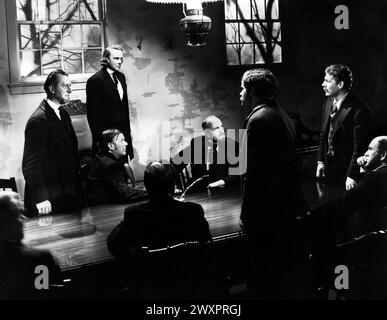 Dean Jagger (debout, 2e à gauche), Brian Donlevy (debout, à l'extrême droite), sur le plateau du film, 'Brigham Young', 20th Century-Fox, 1940 Banque D'Images