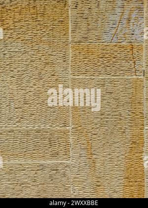 texture des blocs de marbre jaune et blanc pour les carreaux de murs rainurés extérieurs Banque D'Images