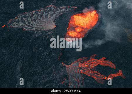 Superbe prise de vue aérienne capturant la puissance brute de la lave en fusion qui coule sur le terrain islandais, avec de la fumée et une chaleur intense rayonnant de la terre Banque D'Images