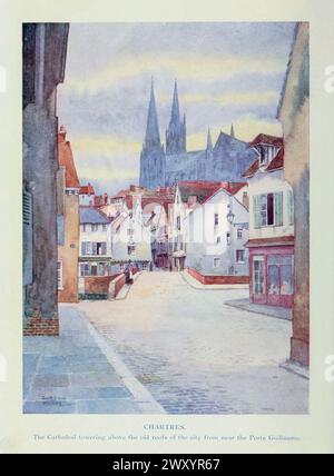 Chartres la cathédrale surplombant les vieux toits près du port de Guillaume 1910 by Gordon Cochrane Home (25 juillet 1878 – 13 décembre 1969) est un paysagiste anglais, écrivain et illustrateur. Chartres est la préfecture du département de l'Eure-et-Loir dans la région Centre-Val de Loire en France Banque D'Images