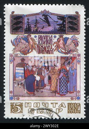 RUSSIE - VERS 1984 : timbre imprimé par la Russie, montre la scène de village d'Ivan Bilibin, vers 1984 Banque D'Images