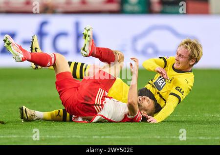 Konrad Laimer, FCB 27 Competition for the ball, Tackling, duel, header, zweikampf, action, lutte contre Julian Brandt, BVB 19 dans le match FC BAYERN MUENCHEN - BORUSSIA Dormond 1-2 le 30 mars 2024 à Munich, Allemagne. Saison 2023/2024, 1.Bundesliga, FCB,, München, journée 27, 27.Spieltag © Peter Schatz / Alamy Live News - LA RÉGLEMENTATION DFL INTERDIT TOUTE UTILISATION DE PHOTOGRAPHIES comme SÉQUENCES D'IMAGES et/ou QUASI-VIDÉO - Banque D'Images