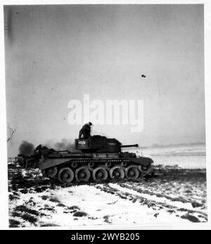 CHAR 'COMET' SUR LA GAMME - légende originale en temps de guerre : le 29e BDE blindé de la 11e Division blindée a été équipé d'un nouveau char, le 'Comet'. Ce char est équipé d'un nouveau canon à 17 pdr qui a une puissance de pénétration beaucoup plus grande que l'ancien canon à 17 pdr. Ces photos montrent la 'Comet' tirant son nouveau canon sur la gamme lors d'un tir d'entraînement par 29 ARMD BDE. Négatif photographique, Armée britannique, 21e groupe d'armées Banque D'Images