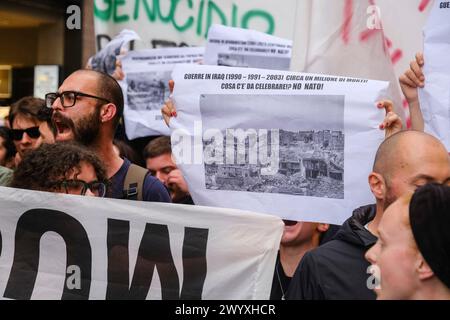 Naples, Italie. 08 avril 2024. Des affrontements entre manifestants et policiers en tenue anti-émeute ont eu lieu il y a peu au bout de la via Toledo à Naples.&#XA;les jeunes manifestants ont tenté de briser le cordon de sécurité pour se rendre au théâtre San Carlo, dans le but de contester le concert prévu pour le 75ème anniversaire de NATO.4 ferrites entre je manifeste anti. Crédit : Live Media Publishing Group/Alamy Live News Banque D'Images