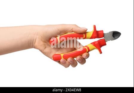 Femme avec une pince diagonale sur fond blanc, gros plan Banque D'Images