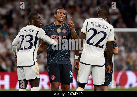 Madrid, Espagne. 09th Apr, 2024. Manuel Akanji de Manchester City se dispute avec Antonio Rudiger du Real Madrid lors du match quart de finale de l'UEFA Champions League entre le Real Madrid CF et Manchester City à l'Estadio Santiago Bernabeu le 9 avril 2024 à Madrid, en Espagne. (Photo de Gerard Franco/Dax images) crédit : DAX images/Alamy Live News Banque D'Images