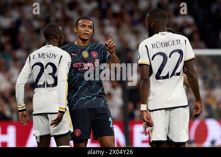 Madrid, Espagne. 09th Apr, 2024. Manuel Akanji de Manchester City se dispute avec Antonio Rudiger du Real Madrid lors du match quart de finale de l'UEFA Champions League entre le Real Madrid CF et Manchester City à l'Estadio Santiago Bernabeu le 9 avril 2024 à Madrid, en Espagne. (Photo de Gerard Franco/Dax images) crédit : DAX images/Alamy Live News Banque D'Images