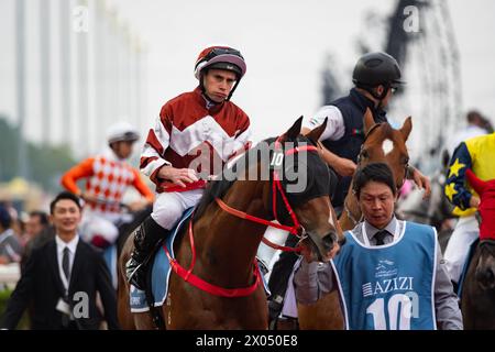 Sight Success et Ryan Moore se dirigent vers le départ pour le G1 Al Quoz Sprint, 30/03/24, hippodrome de Meydan, Dubaï, Émirats arabes Unis. Crédit JTW Equine images / Alamy. Banque D'Images