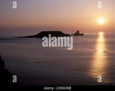 Coucher de soleil à Worm’s Head, Gower. Banque D'Images