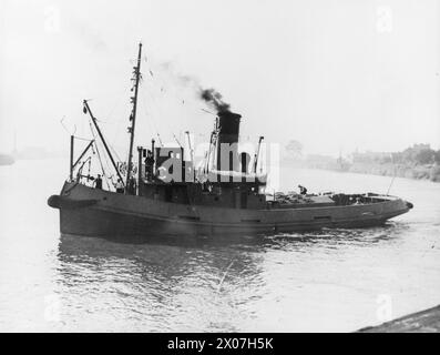 UN NAVIRE DE LA FLOTTE MARCHANDE BRITANNIQUE. - Tug à vapeur 500 tonnes dw Banque D'Images