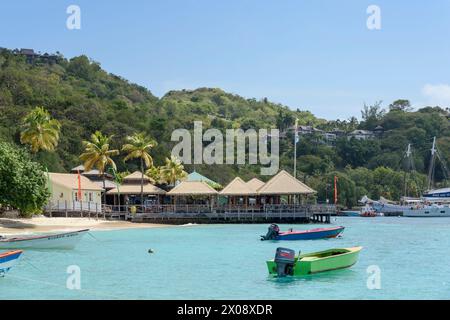 Le légendaire Basil's Bar à Britannia Bay, Lovell Village, Mustique Island, St Vincent et les Grenadines, Caraïbes Banque D'Images