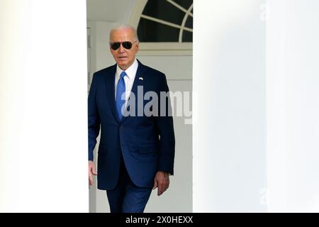 Le président AMÉRICAIN Joe Biden et le premier ministre japonais Fumio Kishida traversent la Colonnade de la Maison Blanche lors d'une visite d'État à Washington, DC, le mercredi 10 avril 2024. (Photo Pool/Sipa USA) Banque D'Images