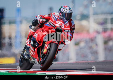 Austin, Texas, États-Unis. 12 avril 2024. Ducati Lenovo Team coureur ENEA BASTIANINI (23 ans) d'Italie lors d'un entraînement au MotoGP Red Bull Grand Prix des Amériques sur le circuit des Amériques. (Crédit image : © Mark Fann/ZUMA Press Wire) USAGE ÉDITORIAL SEULEMENT! Non destiné à UN USAGE commercial ! Banque D'Images