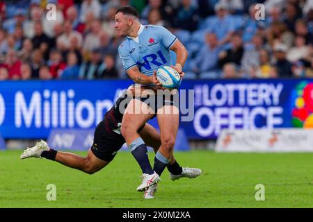 Sydney, Australie. 12 avril 2024. Dylan Pietsch des Waratahs est attaqué lors du match Super Rugby Pacific 2024 Rd8 entre les Waratahs et les Crusaders au stade Allianz le 12 avril 2024 à Sydney, Australie crédit : IOIO IMAGES/Alamy Live News Banque D'Images