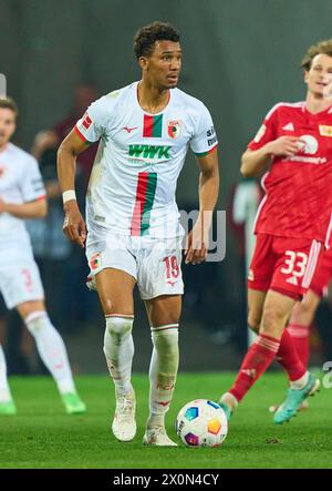 Felix UDUOKHAI, FCA 19 dans le match FC AUGSBURG - 1. FC Union Berlin 2-0 le 12 avril 2024 à Augsbourg, Allemagne. Saison 2023/2024, 1.Bundesliga, FCA, Journée 29, 29.Spieltag photographe : ddp images / STAR-images - LA RÉGLEMENTATION DFL INTERDIT TOUTE UTILISATION DE PHOTOGRAPHIES comme SÉQUENCES D'IMAGES et/ou QUASI-VIDÉO - Banque D'Images