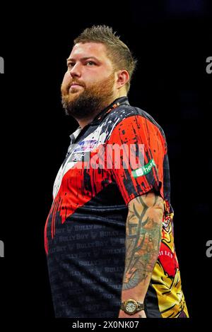 Birmingham, Royaume-Uni. 11 avril 2024. Michael Smith lors de la 2024 BetMGM premier League Darts, Night 11, Birmingham à l'Utilita Arena, Birmingham, Angleterre, Royaume-Uni le 11 avril 2024 crédit : Every second Media/Alamy Live News Banque D'Images