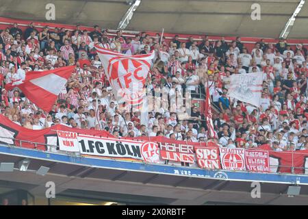 Munich, Allemagne. 13 avril 2024. MUNICH, ALLEMAGNE - 13 AVRIL : fans de 1. FC Koeln lors du match de Bundesliga entre le FC Bayern Muenchen et 1. FC Koeln à l'Allianz Arena le 13 avril 2024 à Munich, Allemagne.240413 SEPA 24 044 - 20240413 PD6147 crédit : APA-PictureDesk/Alamy Live News Banque D'Images