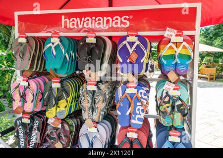 Harvest Caye Island Belize, Norwegian Joy Cruise Line navire, itinéraire de 7 jours de la mer des Caraïbes, privé privé, Havaianas sandales sandales casual sho Banque D'Images